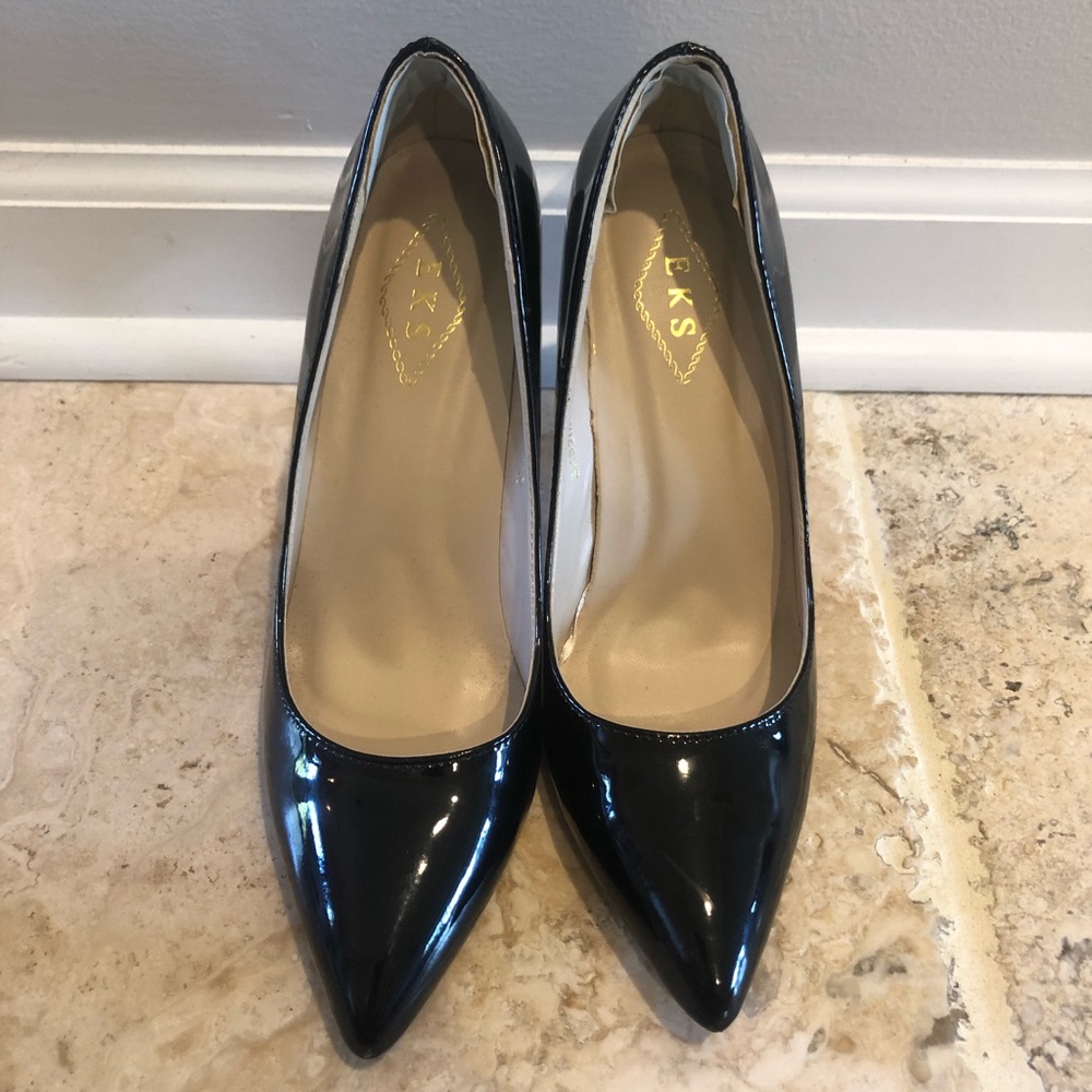 Women’s black patent pumps